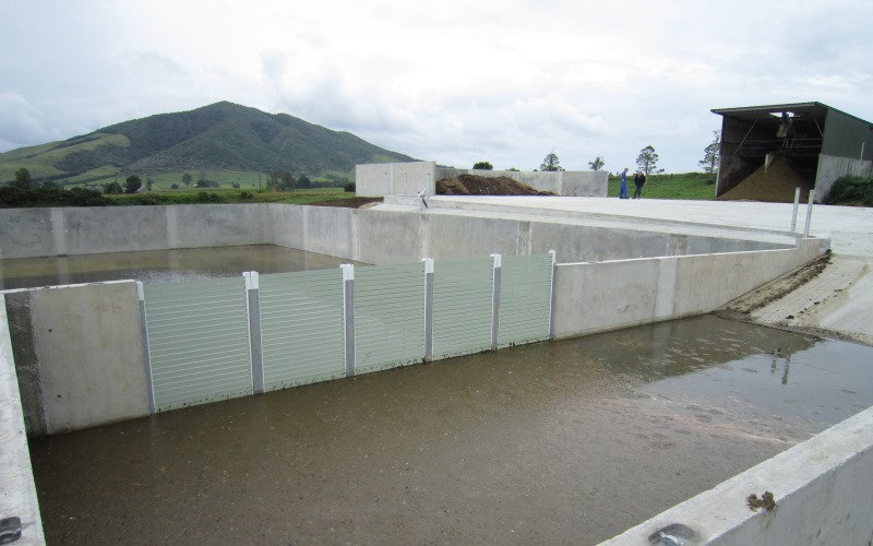 Plastic weeping wall between sand trap and storage tank